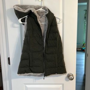 Green fuzzy hooded vest